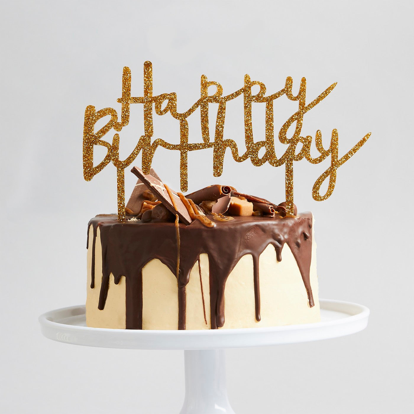 Kakepynt «Happy Birthday» Gull – stemningsbilde fra fest