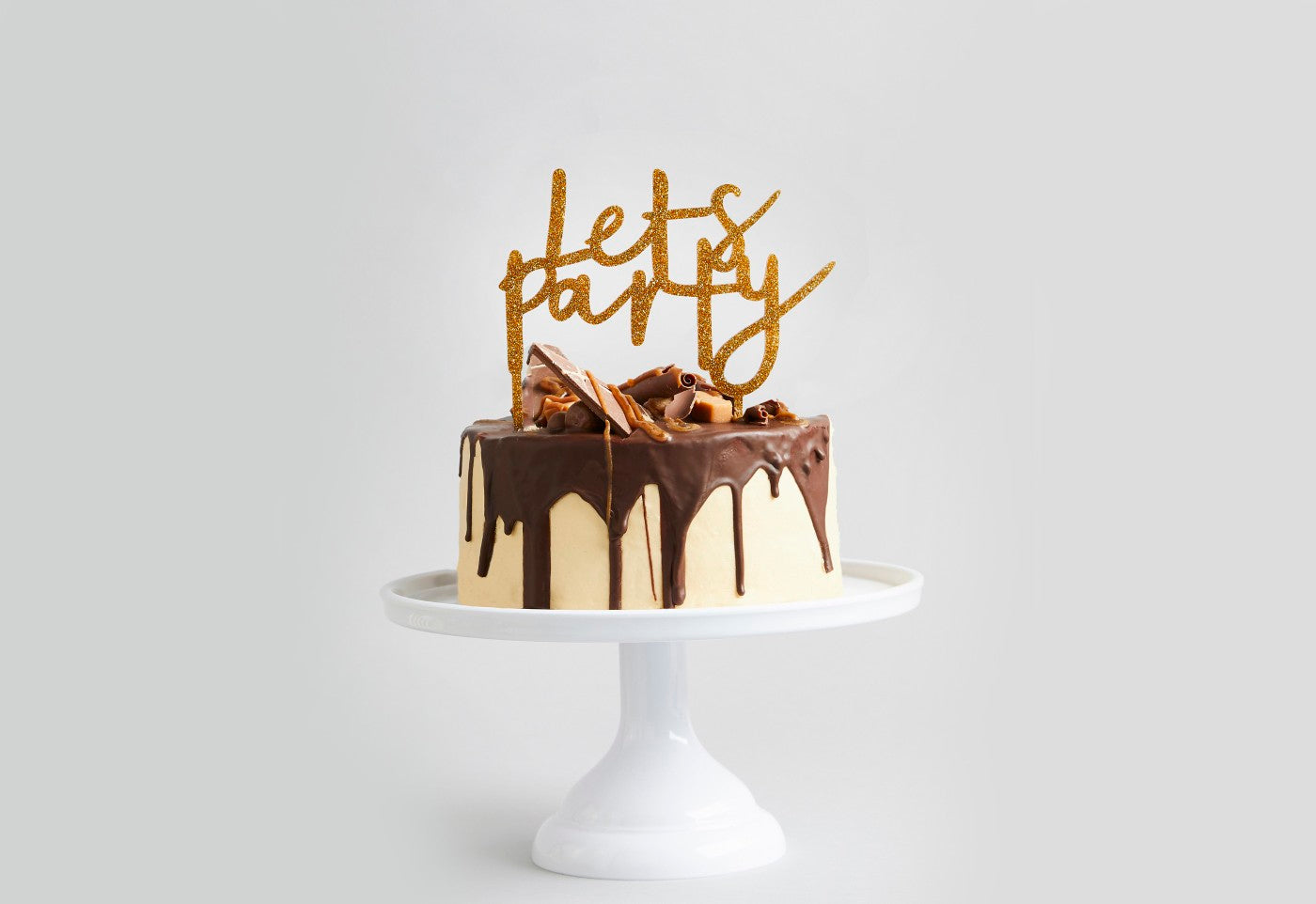 Kakepynt «Let's Party» Gull – stemningsbilde fra fest
